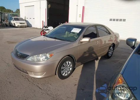 2006 Toyota Camry Le from USA, damaged, VIN 4T1BE32K06U716663